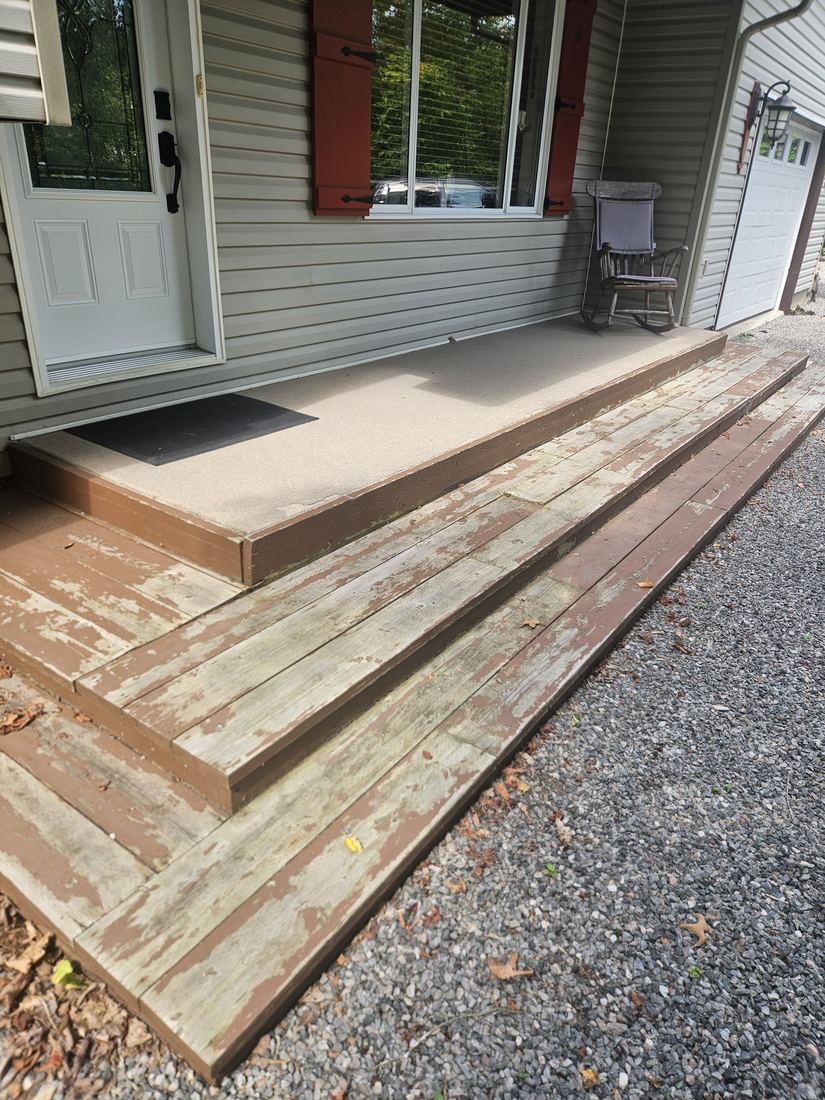Old wood entry steps with peeling paint, side view before the work