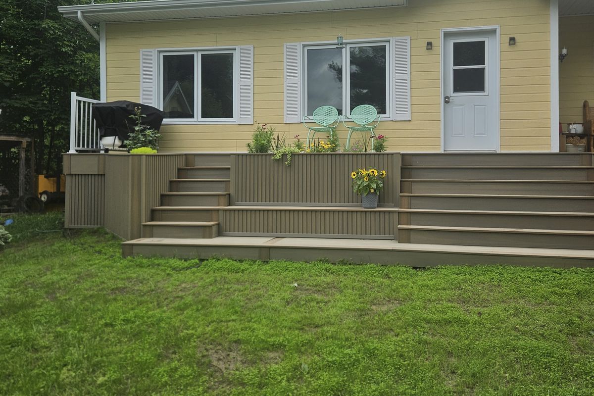 Multi-level composite deck with built-in planters